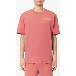 LACOSTE T-shirt λαιμόκοψη 100% βαμβάκι Λεπτομέρεια με ανάγλυφο logo στο στήθος. Contrast πολύχρωμο logo print στο στήθος και στην πλάτη. Ribbed τελείωμα στην λαιμόκοψη κανονικη γραμμη
